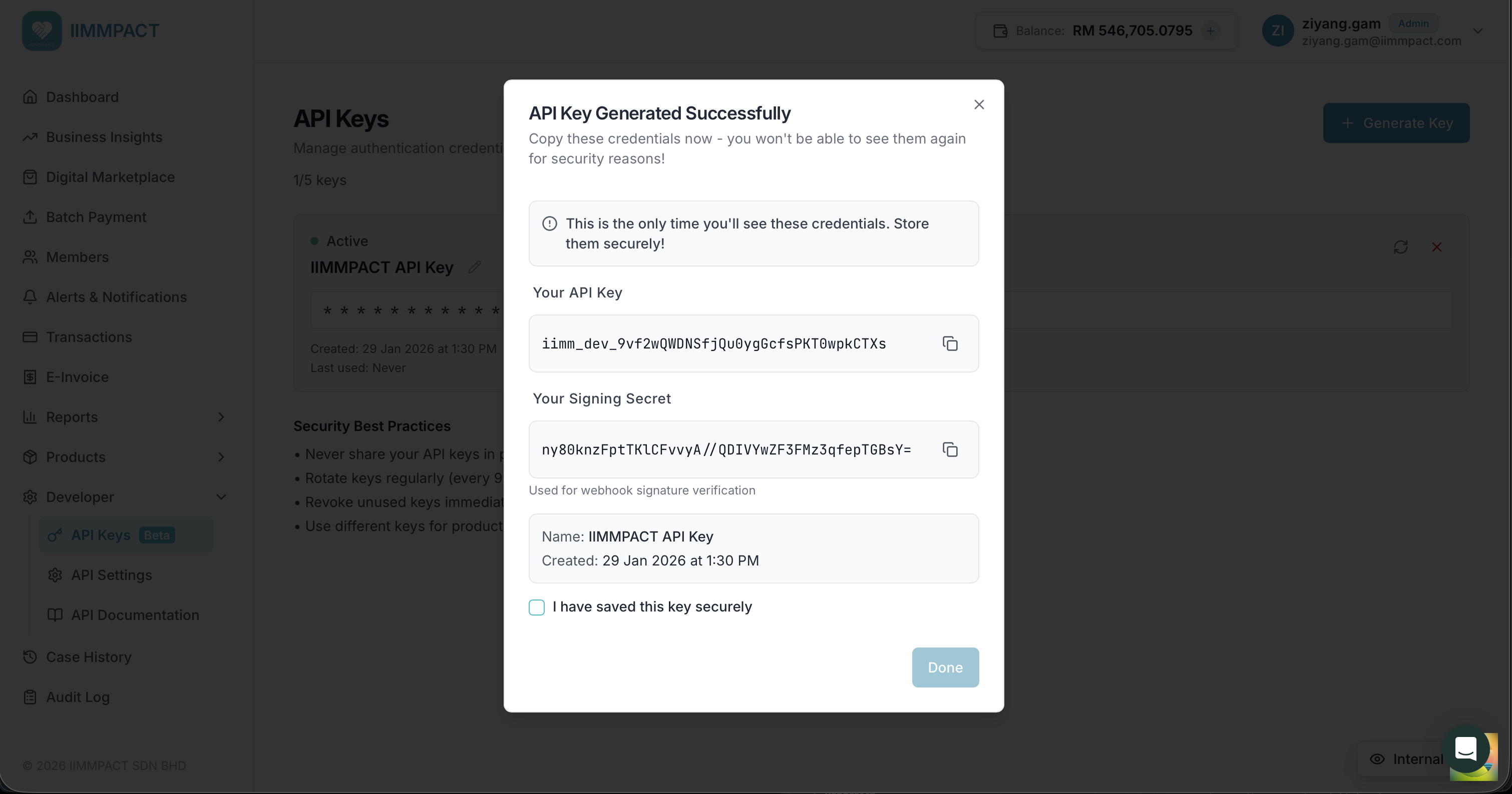 API Key Generated Successfully dialog showing API Key and Signing Secret